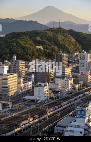 Early morning with Mt Fuji and railway lines with freight train, Shizuoka, Japan Stock Photo