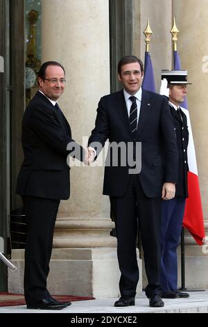 French President Francois Hollande shakes hands with Portuguese Prime Minister Pedro Passos Coelho at the Elysee presidential palace prior to a meeting, in Paris, France on January 17, 2013 Photo by Stephane Lemouton/ABACAPRESS.COM Stock Photo
