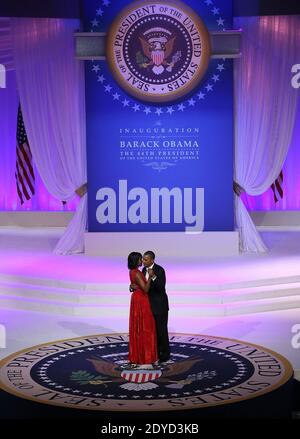 U.S. President Barack Obama (R) dances with first lady Michelle Obama at the Commander-in-Chief Ball in Washington, DC on January 21, 2013. President Obama was sworn-in for his second term as president during a public ceremonial inauguration earlier in the day. Photo by Justin Sullivan/Pool/ABACAPRESS.COM Stock Photo