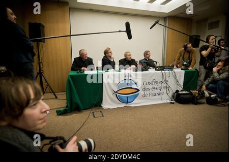Press Conference of Bishops' France following the announcement of the resignation of Pope Benedict XVI, in presence of Clermont-Ferrand's Archbishop Hippolyte Simon, the Cardinal Andre Vingt-Trois, spokesman of the Bishops, Archbishop Bernard Podvin, Lille's Archbishop Laurent Ulrich in Paris, France, on February 11, 2013. Photo by Nicolas Messyasz/ABACAPRESS.COM Stock Photo