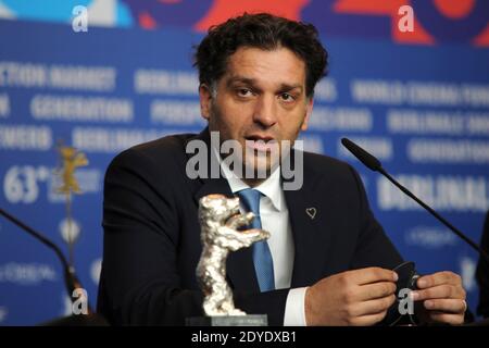 Bosnian director Danis Tanovic with his Silver Bear Jury Grand Prix trophy after receiving it for his film 'Epizoda u zivotu beraca zeljeza' (An Episode in the Life of an Iron Picker) during the Winners' Press Conference during the 63rd Berlinale, Berlin International Film Festival in Berlin, Germany, on February 16, 2013. Photo by Aurore Marechal/ABACAPRESS.COM Stock Photo