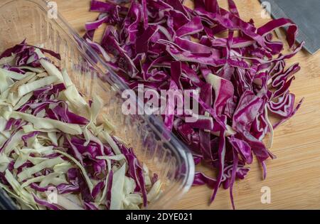 Chopped purple cabbage on the wooden board Stock Photo