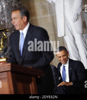 Speaker of the House John Boehner speaks as US President Barack Obama gestures during the unveiling of a statue of African-American civil rights activist Rosa Parks at the United States Capitol in Washington, DC, USA on February 27, 2013. Photo by Olivier Douliery/ABACAPRESS.COM Stock Photo