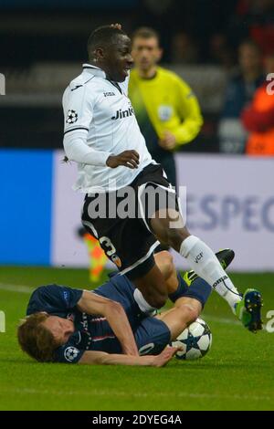 PSG's Clement Chantome battling Valence's Aly Cissokho during the Champion's League 1/8 final soccer match, Paris-St-Germain vs Valence in Paris, France, on March 6th, 2013. PSG and Valence drew 1-1 but PSG qualifies for the 1/4 Finals. Photo by Henri Szwarc/ABACAPRESS.COM Stock Photo