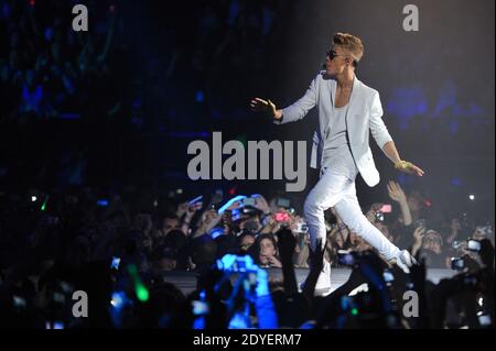 Canadian pop singer Justin Bieber performs live on stage at the POPB concert hall, in Paris, France, on March 19, 2013. Photo by Christophe Guibbaud/ABACAPRESS.COM Stock Photo