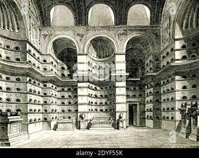 Columbarium of Livia's freed slaves reconstruction after Canina. On the Appian Way, two miles from Rome. This building was discovered in 1726, but has now almost disappeared. Careful measurements and plans were taken at the time, so that the reconstruction may be regarded as accurate,. The ground plan i s a parallelogram, 36 Roman feet long and 21 wide. In the longer sides are three bays, the center one semi-circular, those on each side rectangular. In the shorter sides there is a single bay in the center. Eight rows of niches for cinerary urns run round the walls. Further niches are placed i Stock Photo