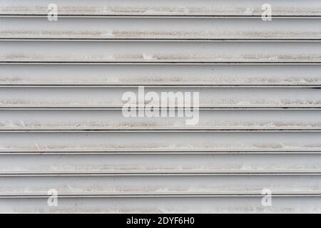 Dirty roller shutter of the market pavilion pattern background Stock Photo