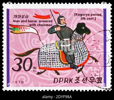 MOSCOW, RUSSIA - FEBRUARY 22, 2019: A stamp printed in Korea shows Horse and rider in chain mail, Koguryo Dynasty Horsemen serie, circa 1979 Stock Photo