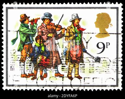 MOSCOW, RUSSIA - FEBRUARY 22, 2019: A stamp printed in United Kingdom shows The Waits, Christmas 1978 - Carol Singers serie, circa 1978 Stock Photo