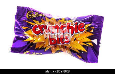 SWINDON, UK - DECEMBER 24, 2020: Cadbuy Crunchie Bits chocolate bar from the Heros selection box. Stock Photo