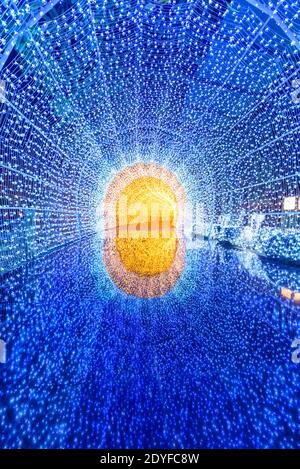 blue lighting tunnel with reflection on ground Stock Photo