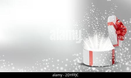 White box in a red ribbon and bow on top. Opened Holiday round box with glowing glitter sparkles and bright rays of light inside. Celebration decoration objects. Vector illustration. Stock Vector