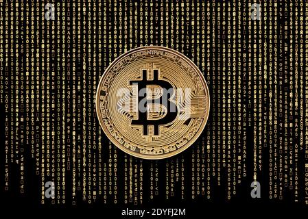 Bitcoin golden coin on golden computer data background Stock Photo