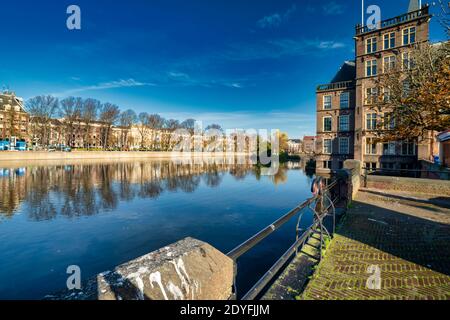 The Hague, The Netherlands - November 9, 2020: Almost deserted park by the pond in the city. Park seen over the water Covid-19 pandemic Concept: COVID Stock Photo