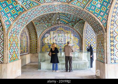 Tourist visiting Khalvat Karimkhani, grave of Nasser ed Din Shah Golestan Palace complex in Tehran, Iran , which is a UNESCO World Heritage site Stock Photo