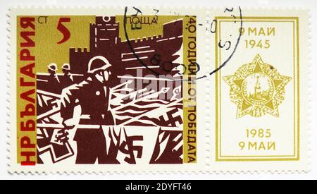 MOSCOW, RUSSIA - JULY 15, 2019: Postage stamp printed in Bulgaria shows Victory Parade, Moscow, 40th Anniversary Of The Victory Day serie, circa 1985 Stock Photo