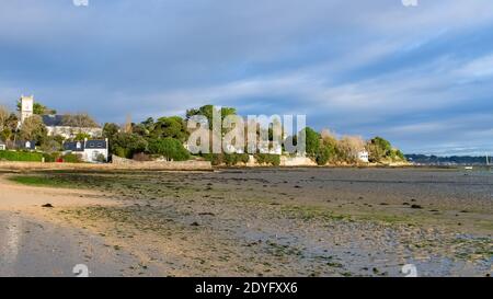 Brittany, Ile aux Moines island in the Morbihan gulf, the church and the Port-Miquel beach at low tide Stock Photo