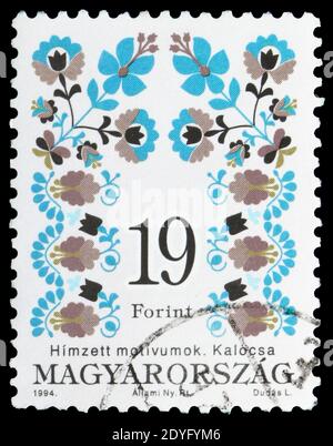 MOSCOW, RUSSIA - JULY 19, 2019: Postage stamp printed in Hungary shows Folk motives of Kalocsa, Hungarian Folk Art serie, circa 1994 Stock Photo