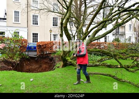 Bristol, UK. 26th Dec, 2020. UK Bristol. Canynge Square in Clifton Village Large Sinkhole opens up in residents private gardens. Picture Credit: Robert Timoney/Alamy Live News Stock Photo