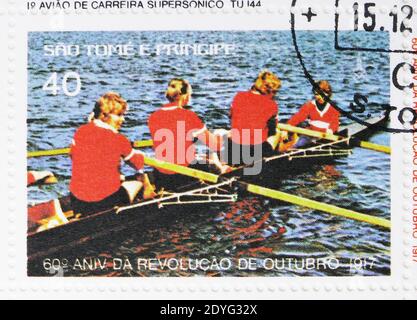 MOSCOW, RUSSIA - JULY 25, 2019: Postage stamp printed in Sao Tome and Principe shows Rowing regatta, 60th anniversary of the October Revolution serie, Stock Photo