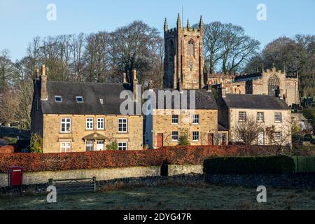 Cottages and St Bartholomew's Church in the Peak District village of Hartington, Derbyshire