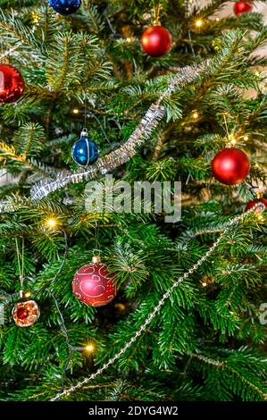 christmas tree full with colorful and decorative balls Stock Photo - Alamy
