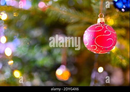 christmas tree full with colorful and decorative balls Stock Photo