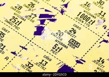 Simple Polish lottery ticket, scratch card, scratch off detail, extreme closeup, macro. Prize numbers, money figures. Gambling, lotteries abstract Stock Photo