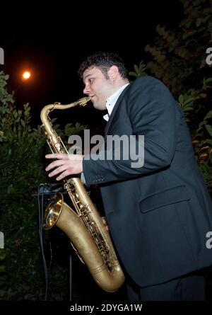 Saxophonist playing saxophone Stock Photo