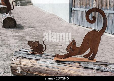 Iron metal figure statue of cat in old swiss town Stock Photo