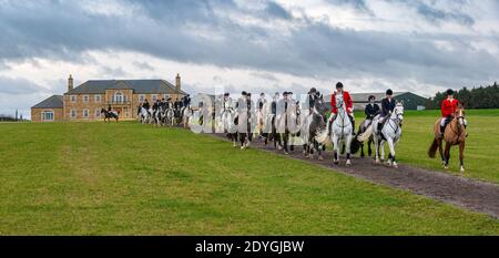 Temple Bruer, Lincolnshire, UK. 26th December 2020. Despite the cancellation of the traditional Boxing Day meets in many towns across the country, due to coronavirus restrictions, the Cranwell Bloodhounds had a home meet that attracted many riders and supporters. Credit: Matt Limb OBE/Alamy Live News Stock Photo