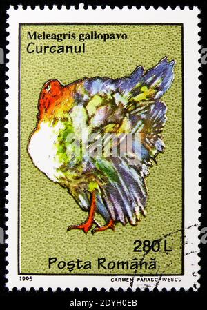 MOSCOW, RUSSIA - AUGUST 8, 2019: Postage stamp printed in Romania shows Domesticated Turkey (Meleagris gallopavo), Birds serie, circa 1995 Stock Photo