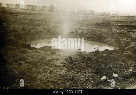 Large shell crater left by shell explosion in France, WWI (32140101002). Stock Photo