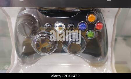 Sealed video game control. Control on sale display. Department store. Nintendo. Technology and fun. Toy and technology. Stock Photo