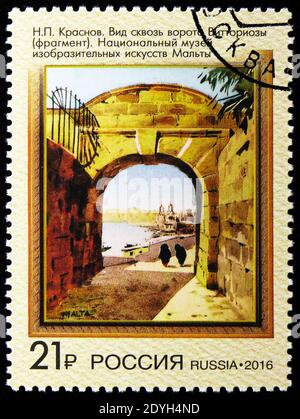 MOSCOW, RUSSIA - AUGUST 10, 2019: Postage stamp printed in Russia shows N.P. Krasnov, View through the gates Vittoriosa, National Museum, Joint issue Stock Photo