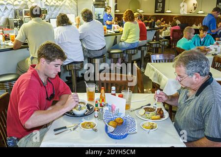 Huntsville Alabama,Blue Plate Cafe restaurant inside interior tables diners,father adult son lunch, Stock Photo