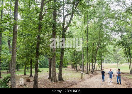 Alabama Marbury Confederate Memorial Park,teen teenage teenager boys brothers father family walking hiking Nature Trail, Stock Photo