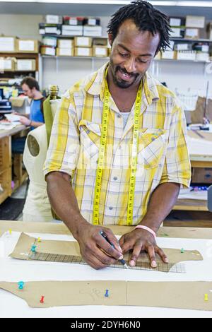 Alabama Montgomery Alabama Shakespeare Festival costume,Black man male tailor pattern working, Stock Photo