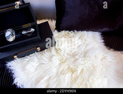 Diamond in a box on a luxury seat with a pillow Stock Photo