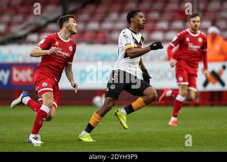 Crawley Town's Jordan Tunnicliffe (left) and Newport County's Tristan Abrahams chase the ball during the Sky Bet League Two match at the People's Pension Stadium, Crawley. Stock Photo