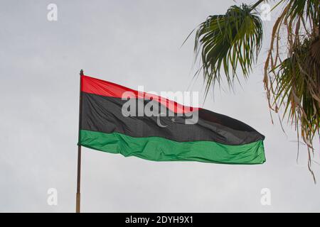 Flag of the state of Libya The flag of Libya was originally introduced in 1951, following the creation of the Kingdom of Libya. Stock Photo