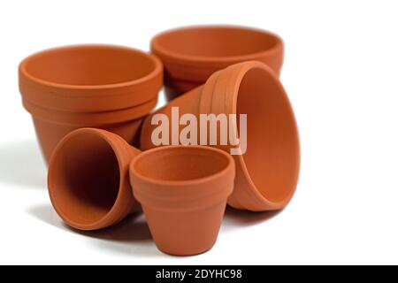 Empty flower pots isolated against white background Stock Photo - Alamy