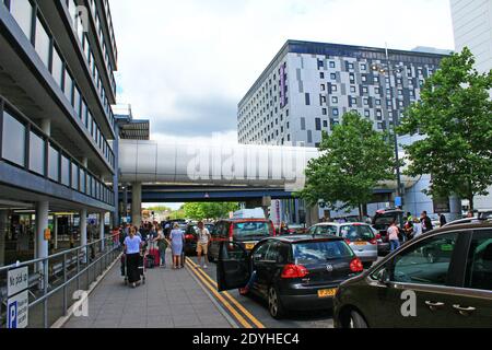 View of the Gatwick Airport North Terminal Drop Off zone,on the lower level forecourt between the Sofitel and the multi-storey car park.UK,August 2016 Stock Photo