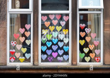 Rainbows in the windows of houses in Aylestone, Knighton and Clarendon Park in support of the NHS workers during the Coronavirus Pandemic Stock Photo