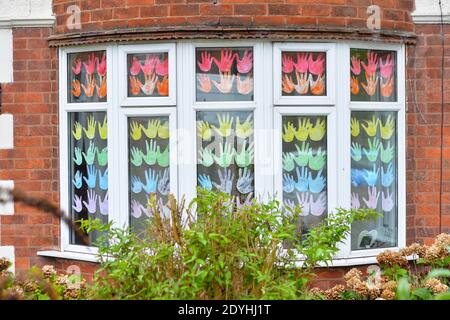 Rainbows in the windows of houses in Aylestone, Knighton and Clarendon Park in support of the NHS workers during the Coronavirus Pandemic Stock Photo