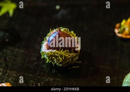 Starter in the form of a chestnut at Restaurant Rakan. Atsuko Kato's presentation of food combines visual aesthetics with authentic flavour. Typical Japanese Dinner by Atsuko Kato Stock Photo