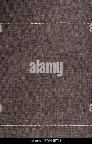 Textile surface. Gray fabric background. Vertical frame. Stock Photo