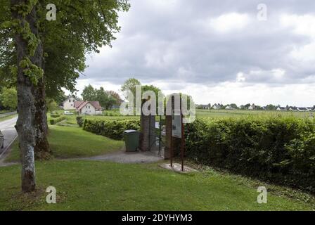 World War 1 ace Manfred von Richthofen, the Red Baron, was originally buried in the area between the gate and graves at Bertangles cemetery France. Stock Photo