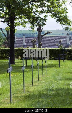 German WW1 soldier graves marked by iron crosses at Bray sur Somme Deutscher Soldatenfriedhof (German soldier cemetery) Bray sur Somme, France. Stock Photo