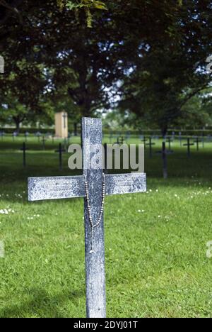 German WW1 soldier graves marked by iron crosses at Bray sur Somme Deutscher Soldatenfriedhof (German soldier cemetery) Bray sur Somme, France. Stock Photo